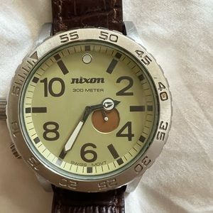 Nixon men’s stainless steel vintage 1999 watch.Simplify 51-30 300 M Swiss